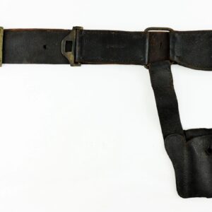 A worn U.S. Foot Artillery Belt made of black leather with a brass buckle featuring an eagle insignia and an attached holster-style pouch.