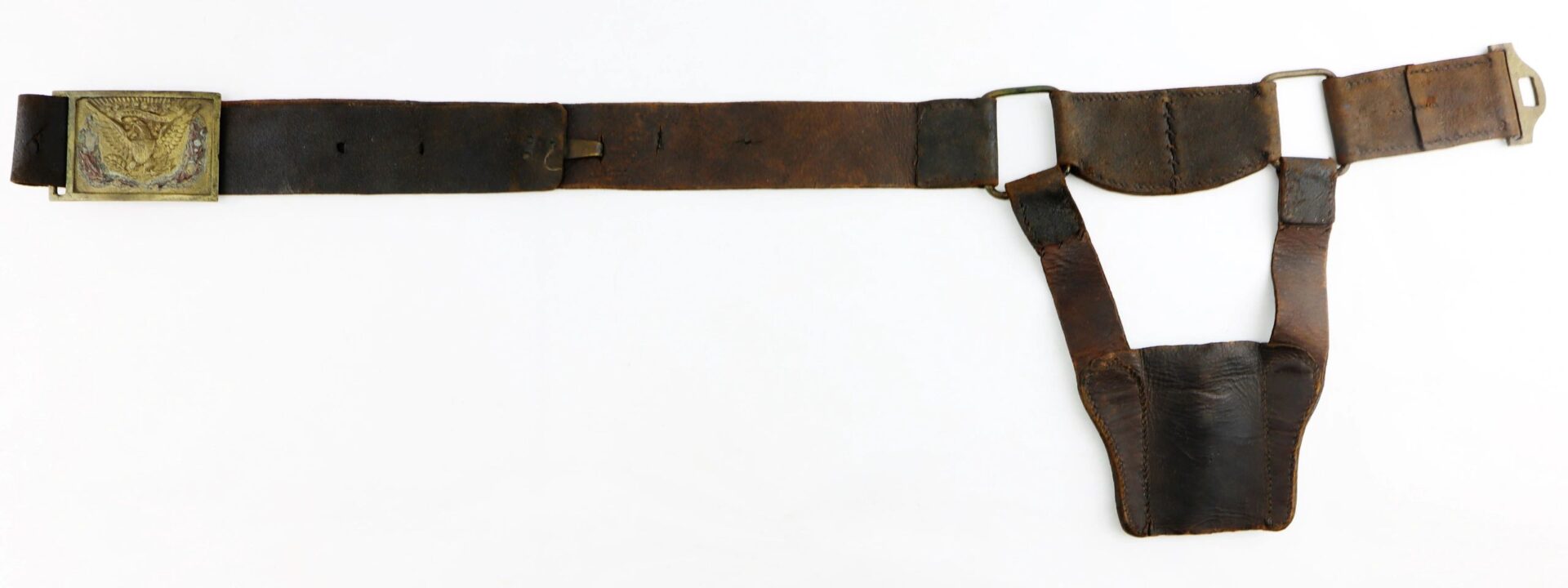 U.S. Foot Artillery Belt: worn leather military belt with brass eagle buckle and attached leather holster, displayed on a white background.