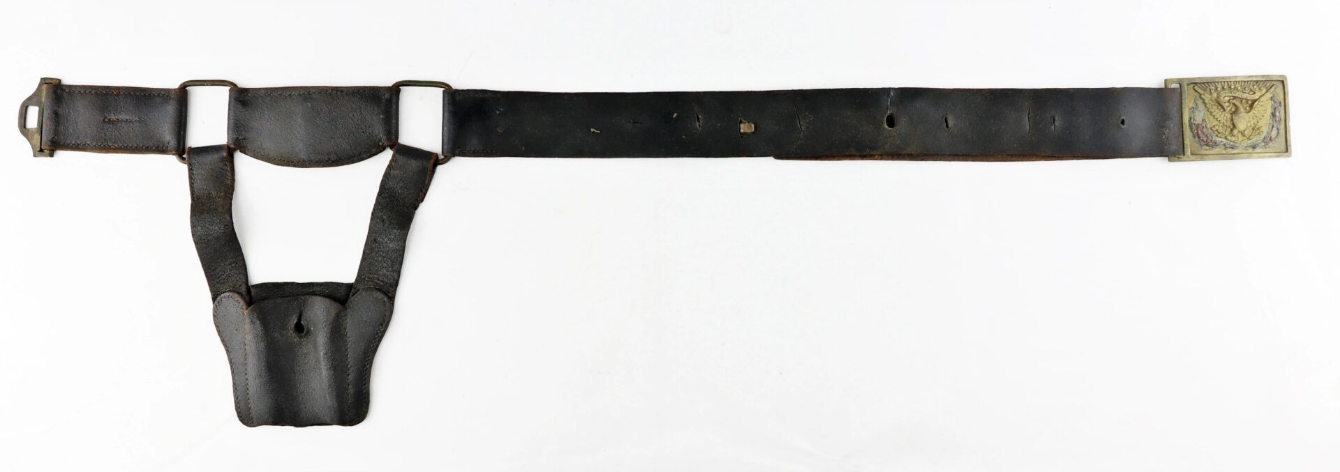 A U.S. Foot Artillery Belt made of worn black leather, featuring a metal buckle with an eagle emblem and an attached holster, shown against a white background.