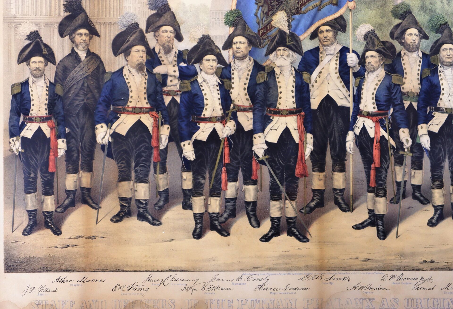The Very Rare and Colorful 1861 Print shows Officers and Staff of the Putnam Phalanx as originally constituted, standing in uniform with swords in front of Hartford’s Old State House, each figure labeled by name.