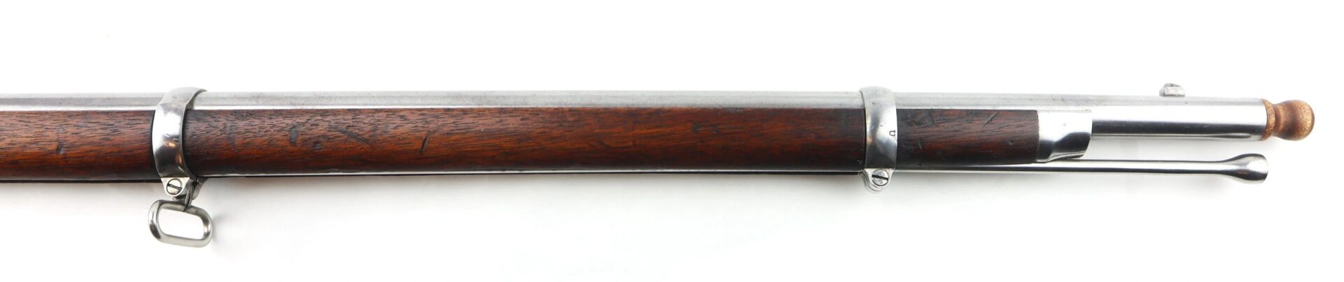 Close-up view of a U.S. Model 1861 Special Colt Contract Rifle Musket dated 1864 (SLD) showing the wooden stock, metal fittings, and a cleaning rod attached underneath the barrel.