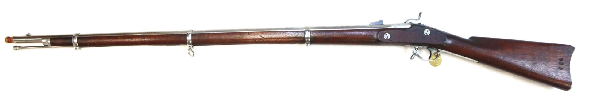 The U.S. Model 1861 Special Colt Contract Rifle Musket, dated 1864 (SLD), is a vintage single-shot, bolt-action rifle featuring a wooden stock and metal barrel, displayed on a white background.