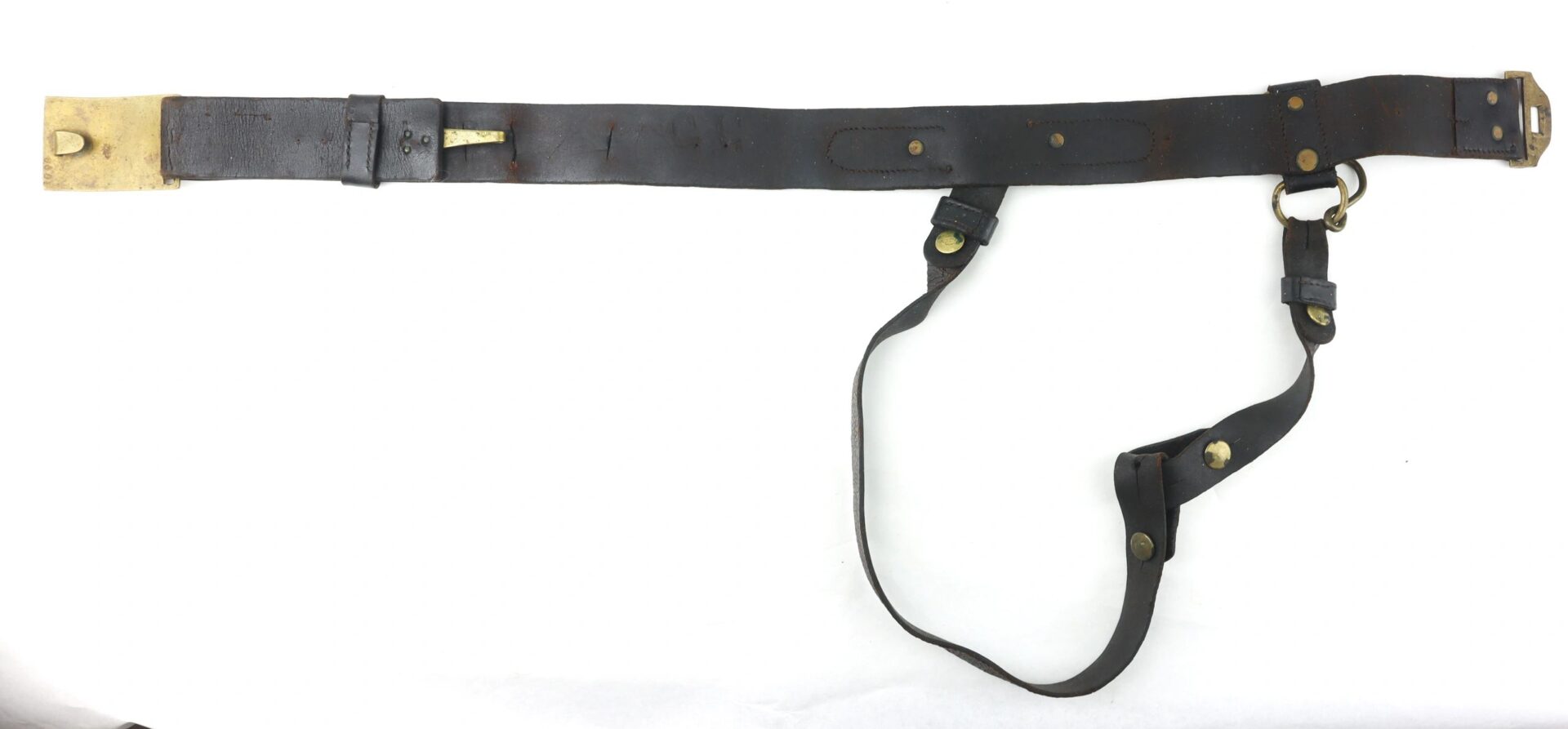 The Model 1851 Saber Belt is a vintage black leather military or police belt featuring a brass buckle, metal rivets, and an attached shoulder strap, shown on a white background.