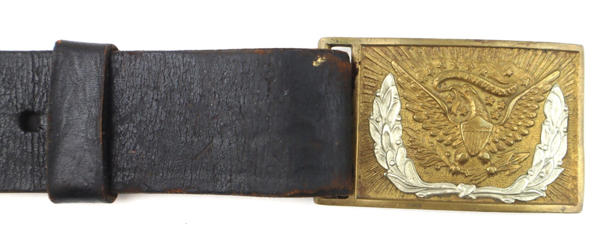 The Model 1851 Saber Belt is a worn black leather belt with a brass buckle embossed with an eagle, shield, and laurel design.