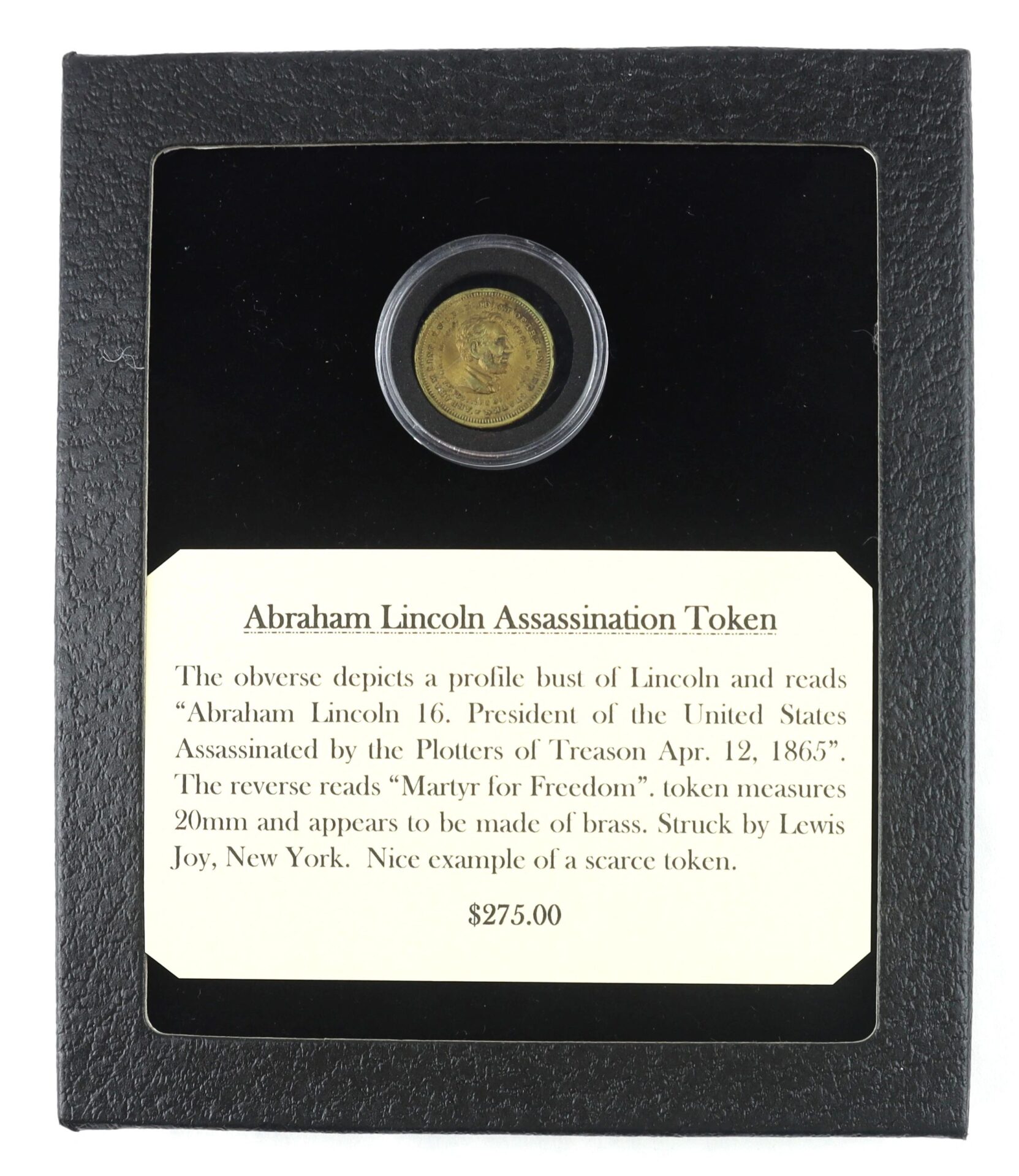 The Abraham Lincoln Assassination Token is crafted from brass and comes in a display case featuring a descriptive plaque. Price: $275.