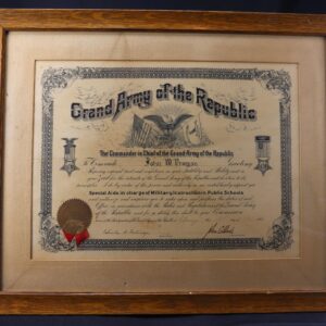 Framed G.A.R. Document appointing John W. Putnam as Special Aide for Military Instruction in Public Schools, featuring a gold seal and signature.