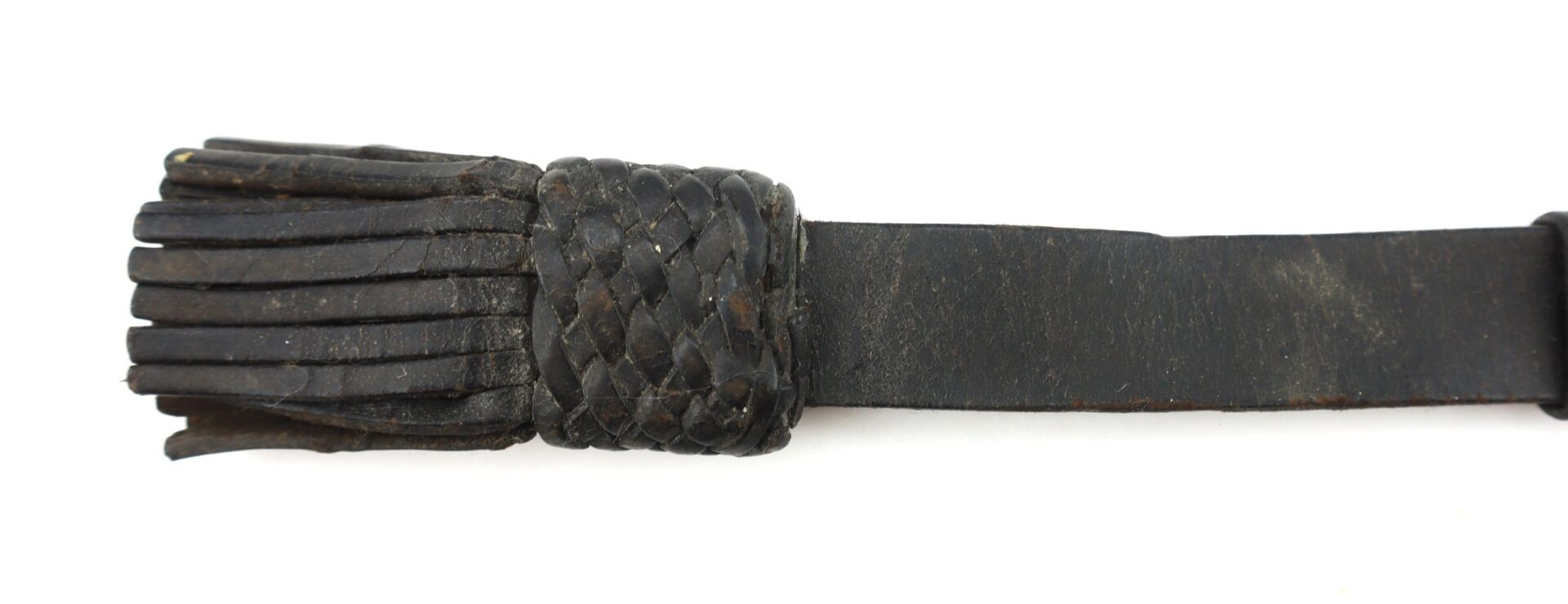 A close-up of the Civil War Saber Knot, featuring a braided handle and multiple leather tails.