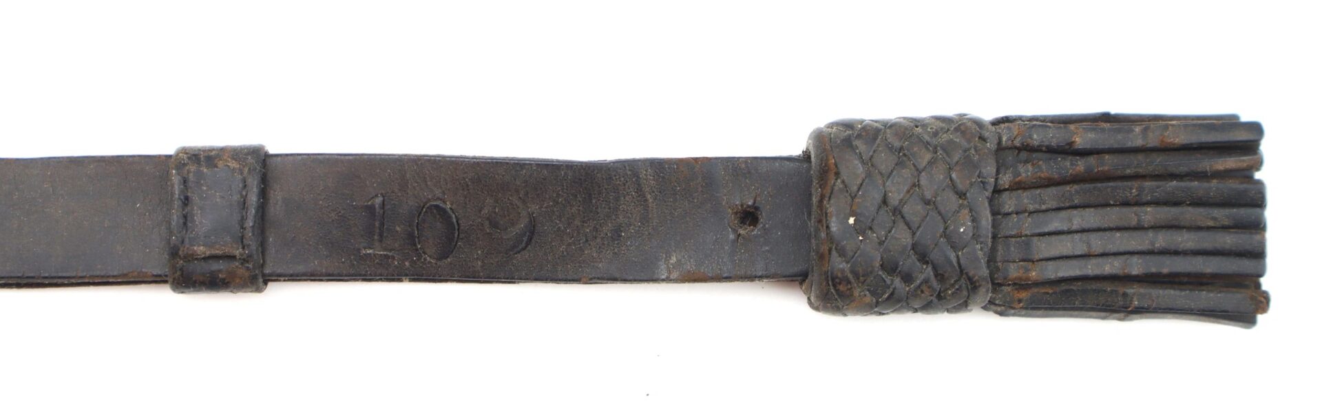 A close-up of the Civil War Saber Knot / SOLD shows a dark leather strap stamped with "109" and a braided section ending in several narrow strips.