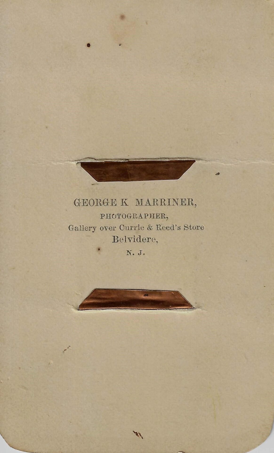 The back of the Lincoln Mourning CDV reads: "George K. Marriner, Photographer, Gallery over Currie & Reed's Store, Belvidere, N.J." and features two brown photo corners.