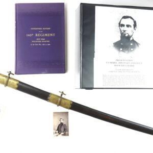 A Presentation U.S. Model 1850 Staff and Field Officer's Sword (Major John Higgins, 143rd NY Infantry Regiment) is displayed with a purple book, black binder with portrait, and sepia photograph on a white background.