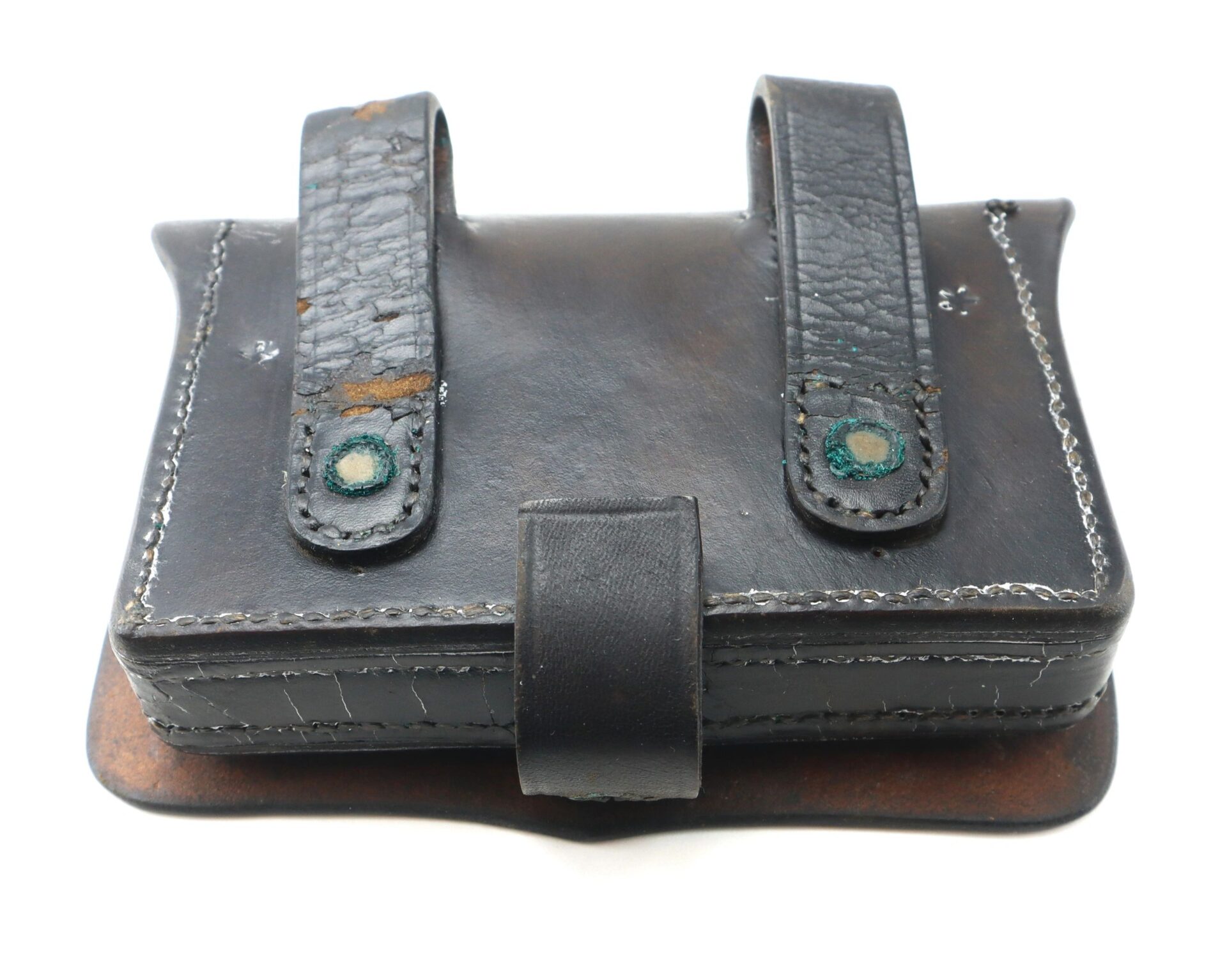 A well-worn black leather Pistol Cartridge Box with two straps, featuring scuffed edges and faded spots, is displayed against a white background. SOLD.