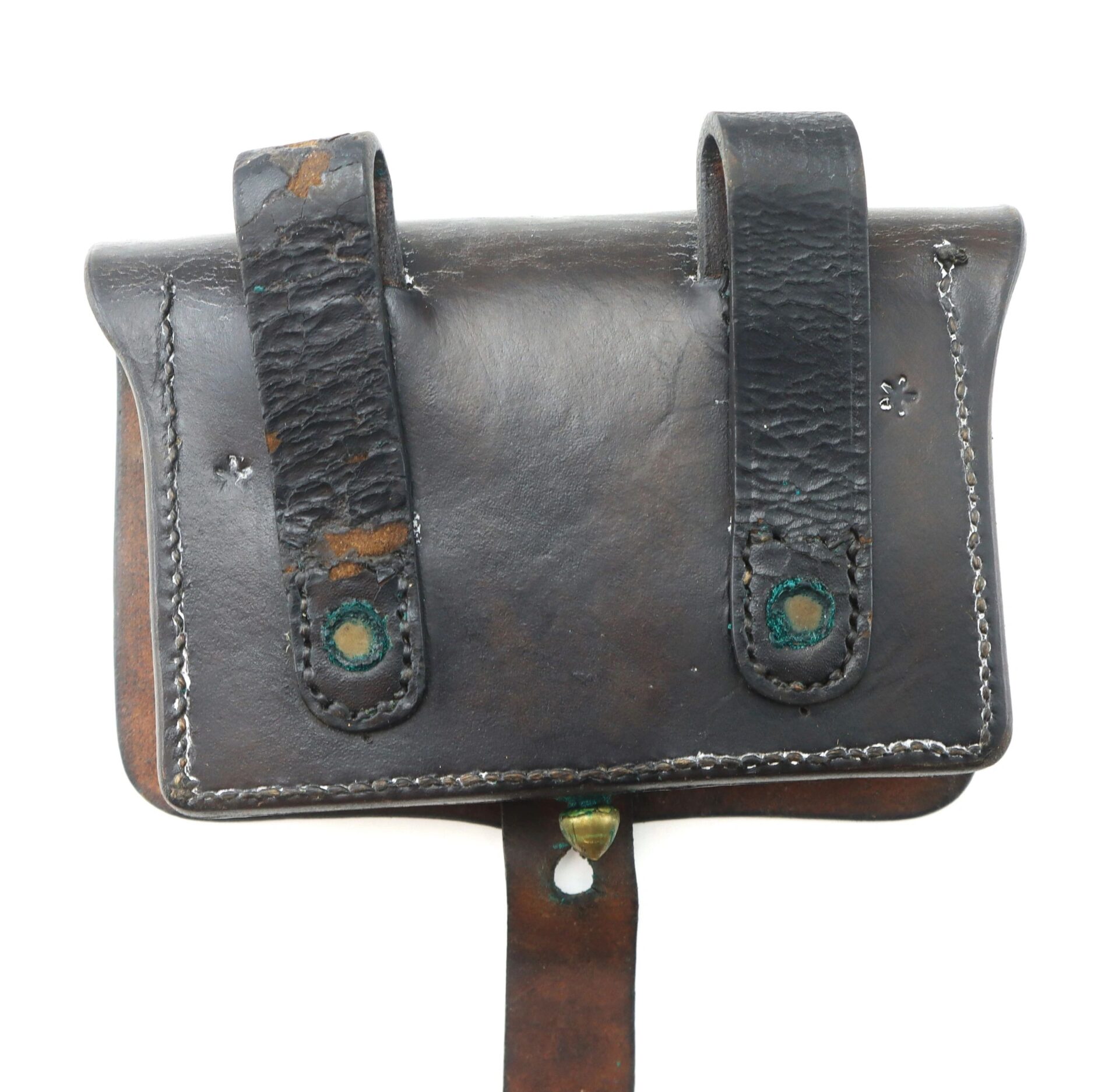 A used Pistol Cartridge Box with black leather, two belt loops, visible stitching, and oxidation around the rivets.