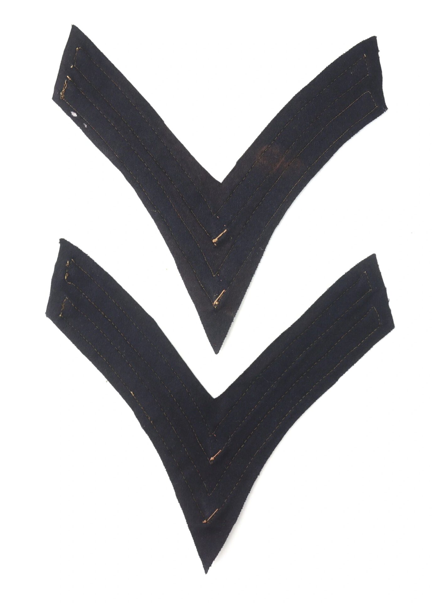 Two black fabric chevrons with stitched edges, arranged parallel on a white background; Original Civil War Federal Regulation Chevrons Artillery Corporal.