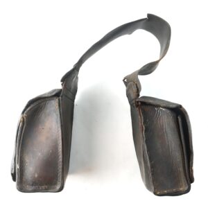The Medical Saddle Bags are two rectangular, worn leather bags connected by a wide strap, displayed against a plain white background.