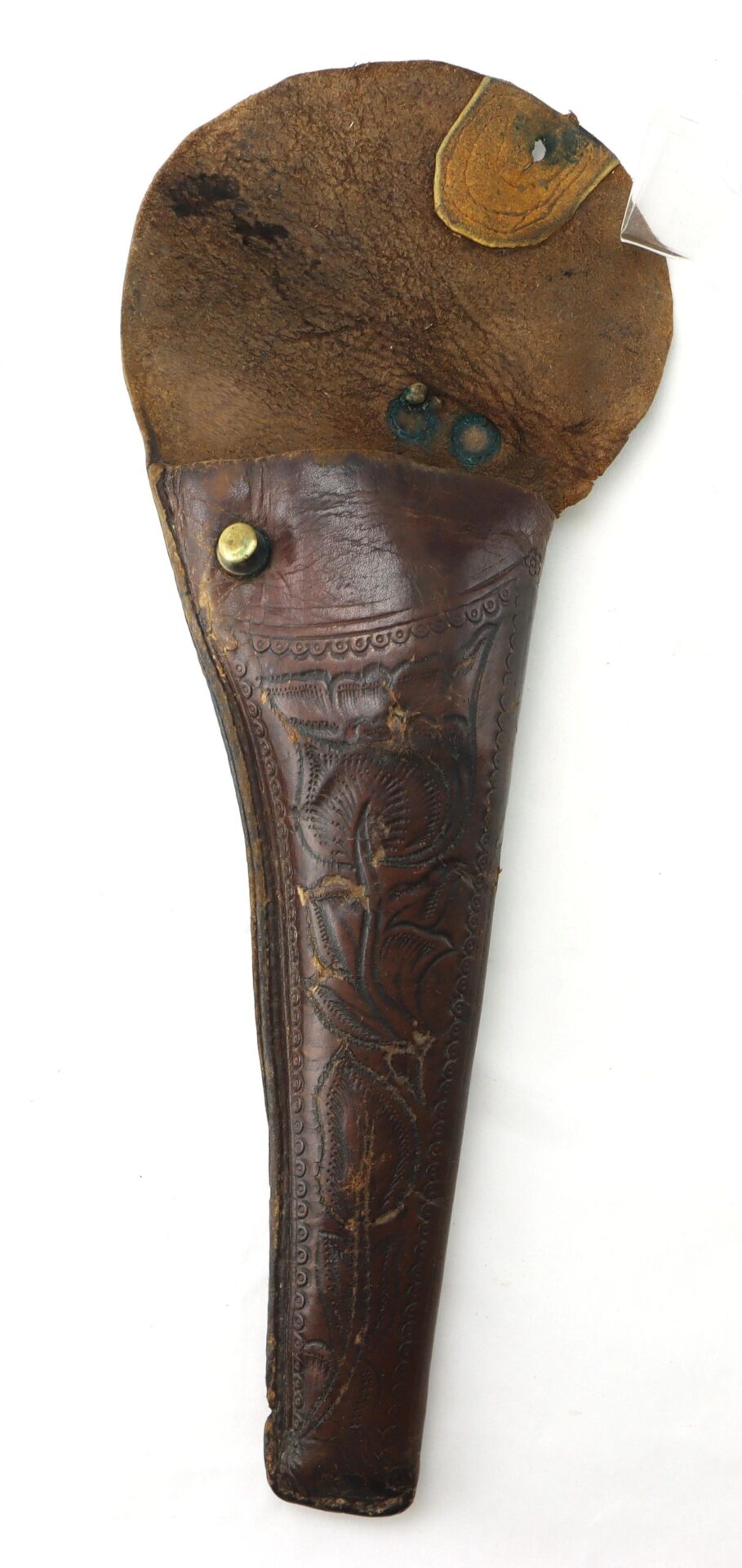 The Wonderful “Rose of Texas” Holster is a brown, tooled leather gun holster with a worn flap and metal rivets, displayed on a plain white background.