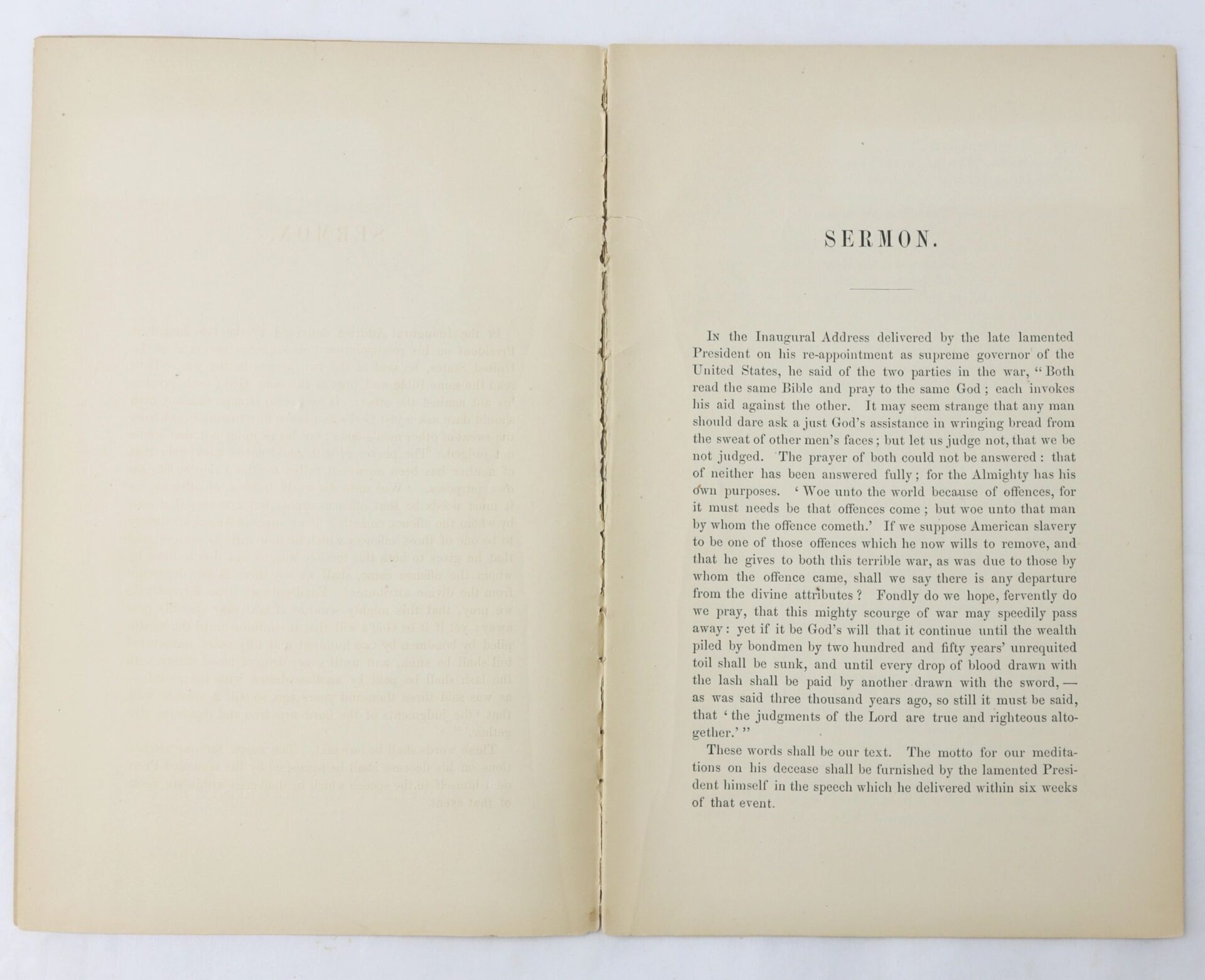 An open book titled "Sermon on the Assassination of Abraham Lincoln / SOLD" displays a two-page spread: the right page, labeled "SERMON," features several paragraphs; the left page is mostly blank.