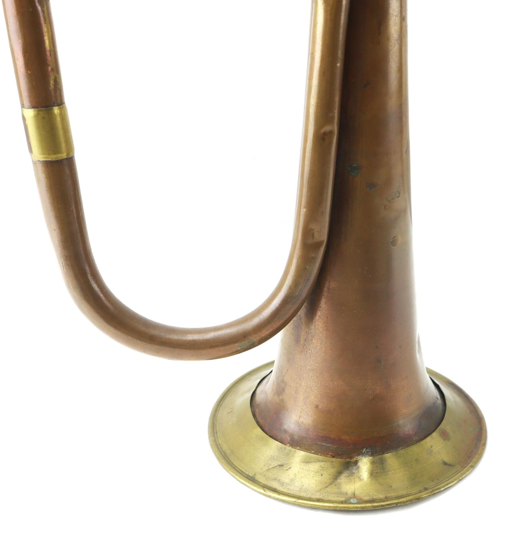 Close-up of a Civil War Bugle with a curved brass tube and flared bell, displayed against a white background.