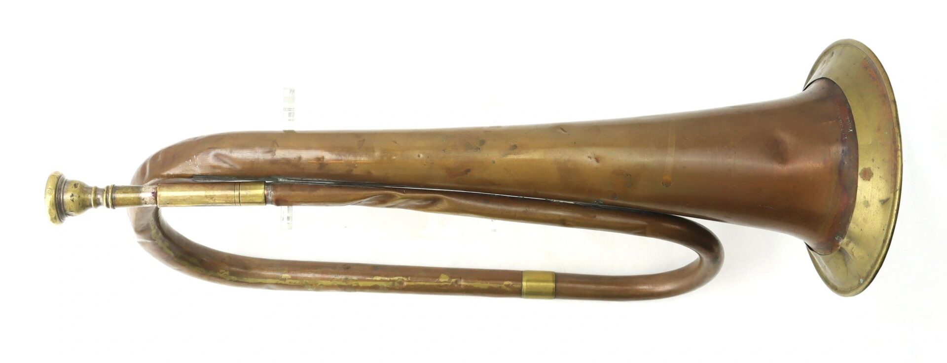 A Civil War Bugle with a bent, tarnished brass body and flared bell is displayed against a white background.