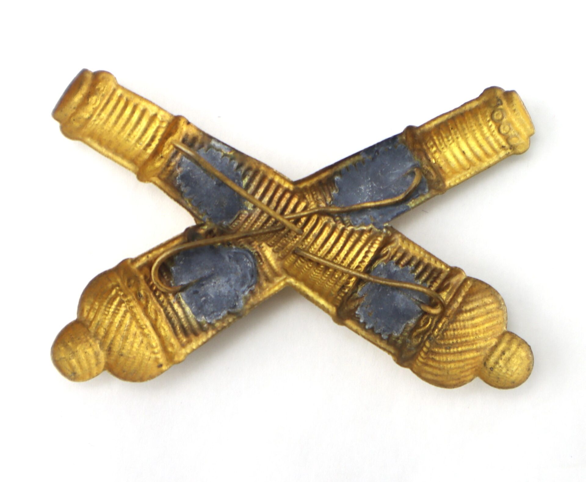 A Small Officer’s False Embroidered Cross Cannon insignia in gold with blue detailing, displayed against a white background.
