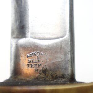 Close-up of the Model 1860 Cavalry Saber by Emerson and Silver, Trenton, NJ, dated 1864, showing "Emerson & Silver, Trenton, N.J." stamped near the handle with visible wear. Includes scabbard. / SOLD.