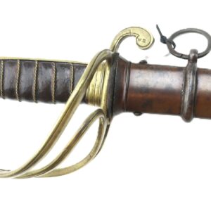 A close-up of an 1837-dated Ames Model 1833 Dragoon Saber featuring a brass hilt and leather-wrapped grip, shown partially sheathed in its metal scabbard.