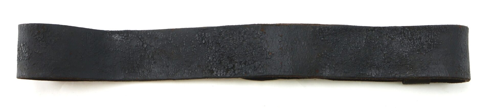 An Original Civil War Union Enlisted Infantryman’s Belt with “US” buckle, featuring a flat, worn black leather strap with textured surface and slightly uneven edges, displayed on a white background.