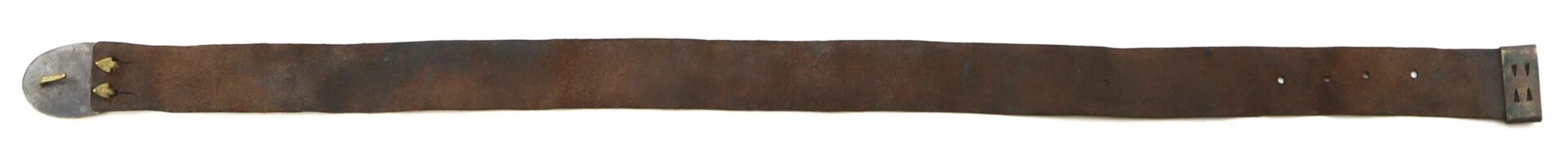 An Original Civil War Union Enlisted Infantryman’s Belt, brown leather, featuring a “US” metal buckle on one end and a metal tip with two brass rivets on the other.