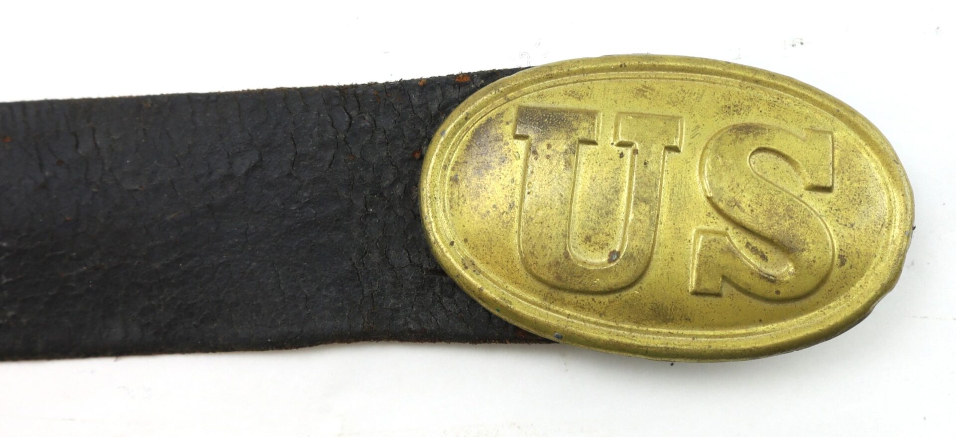 Original Civil War Union Enlisted Infantryman’s Belt with “US” brass oval buckle attached to a black leather strap.