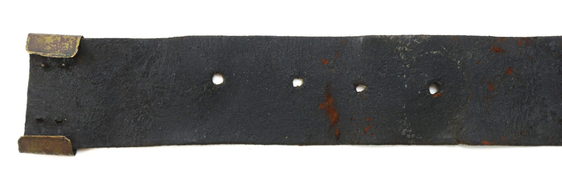 Close-up of the Original Civil War Union Enlisted Infantryman’s Belt with “US” Buckle shows a worn black leather strap, metal tips, four round holes, and visible rust and aging.
