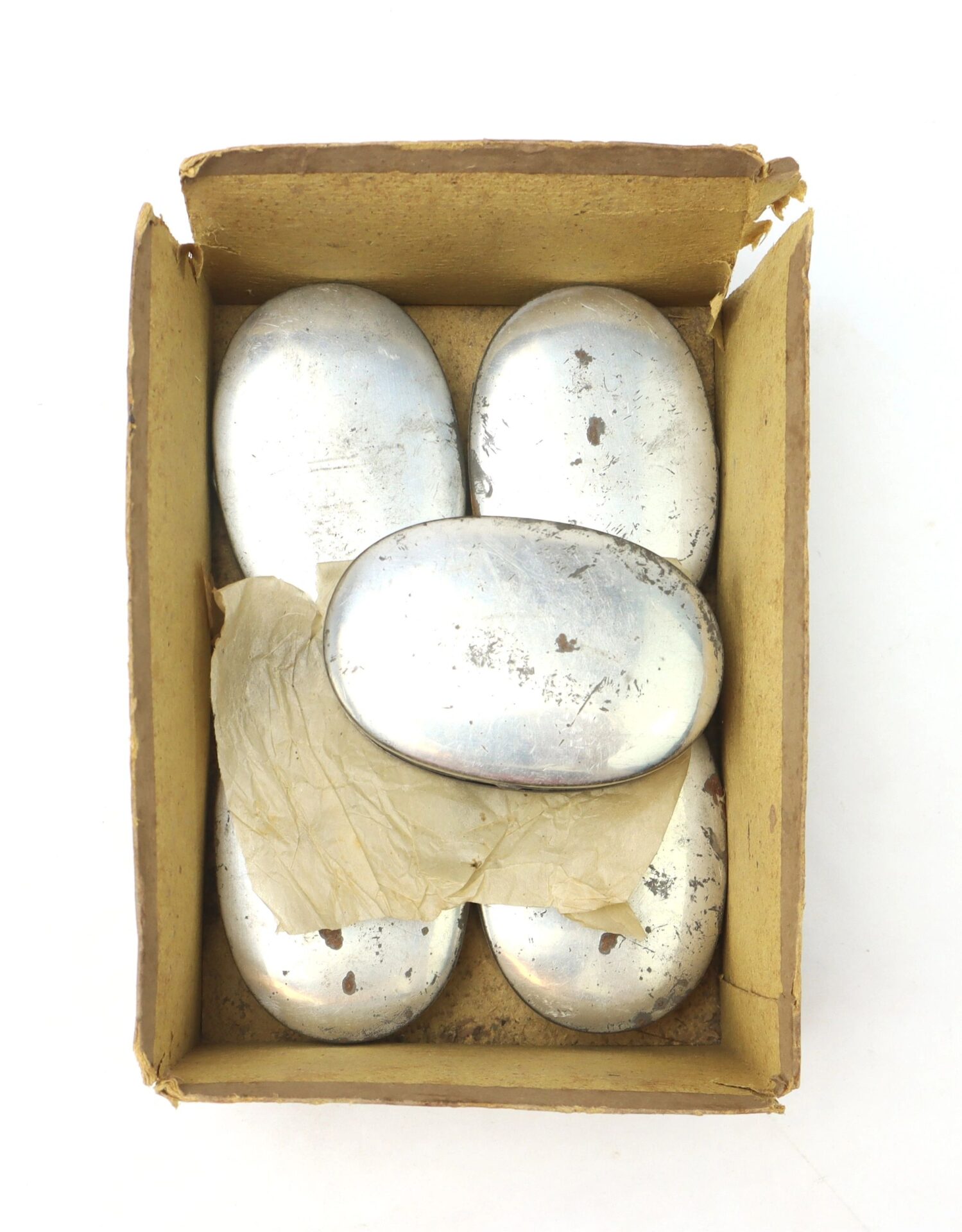A boxed set of five Parker Patent Tobacco Snuff Boxes—oval-shaped, metallic, and “New Old Stock”—with one partially wrapped in tissue paper, all in the original cardboard box.