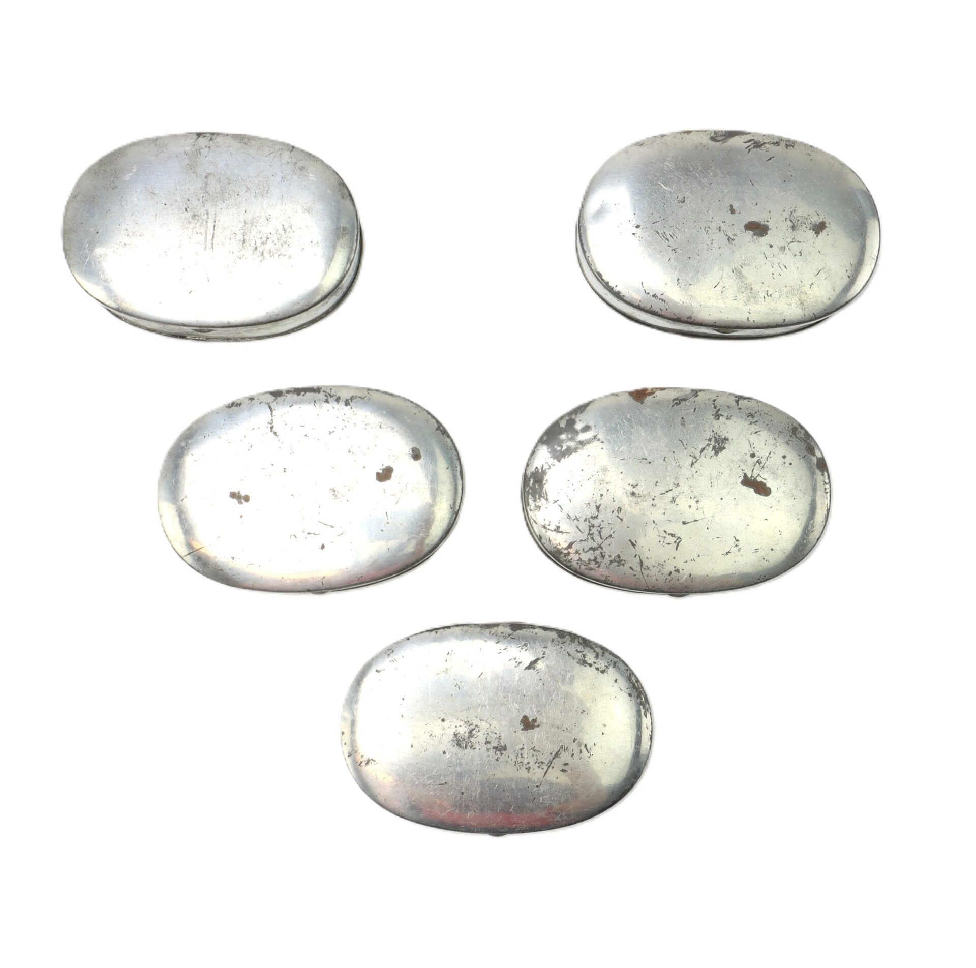 A Boxed Set of 5 Parker Patent Tobacco Snuff Boxes (“New Old Stock”) is displayed in a V shape; each silver-colored metal box shows worn, scratched surfaces against a white background.