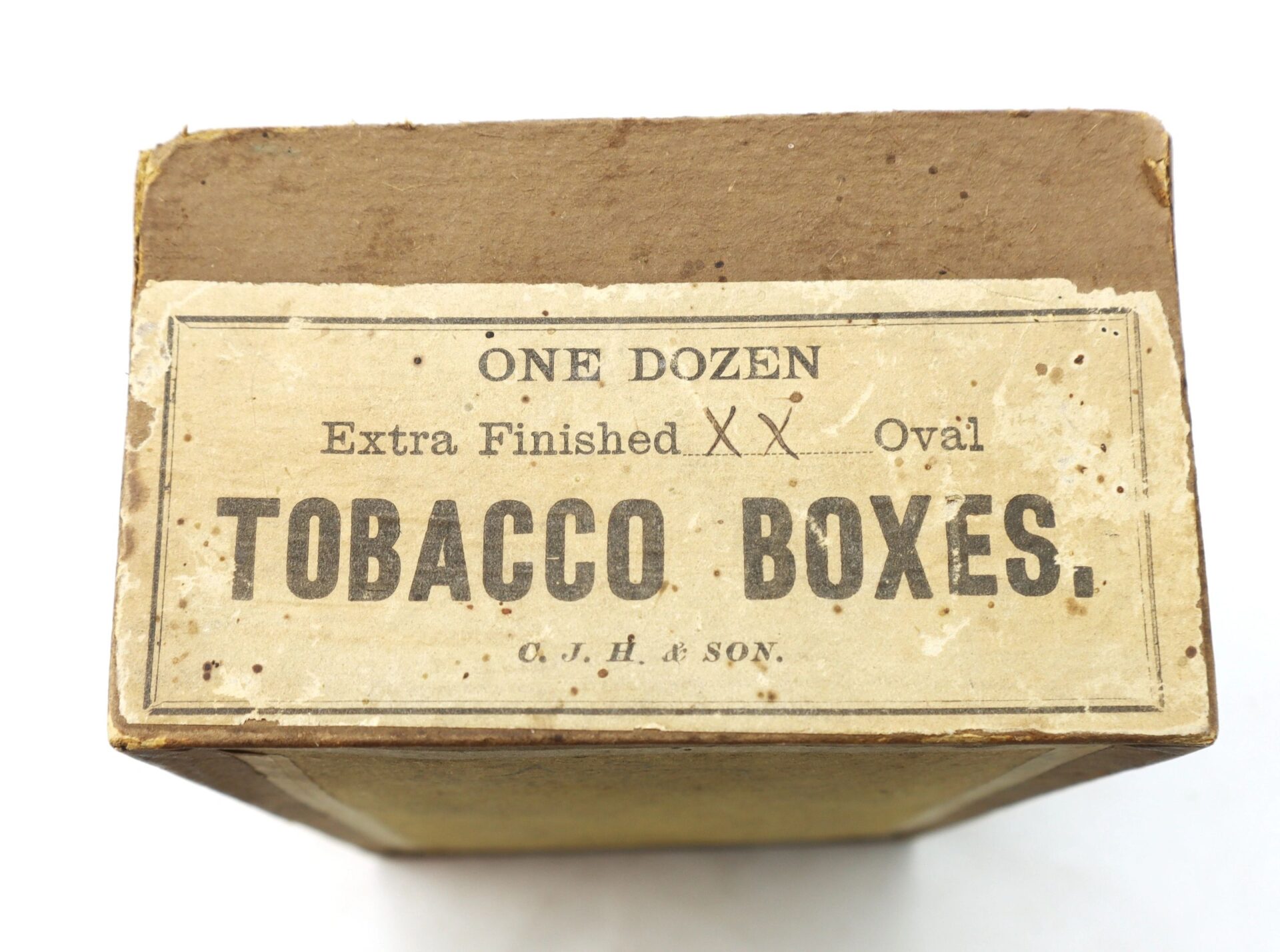 A close-up of a vintage box labeled "Boxed Set of 5 Parker Patent Tobacco Snuff Boxes – 'New Old Stock' in Original Box." The packaging shows visible signs of age and wear.