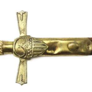 A brass-hilted sword with a ribbed ivory handle, ornate crossguard, and a partially sheathed, dark-toned blade.