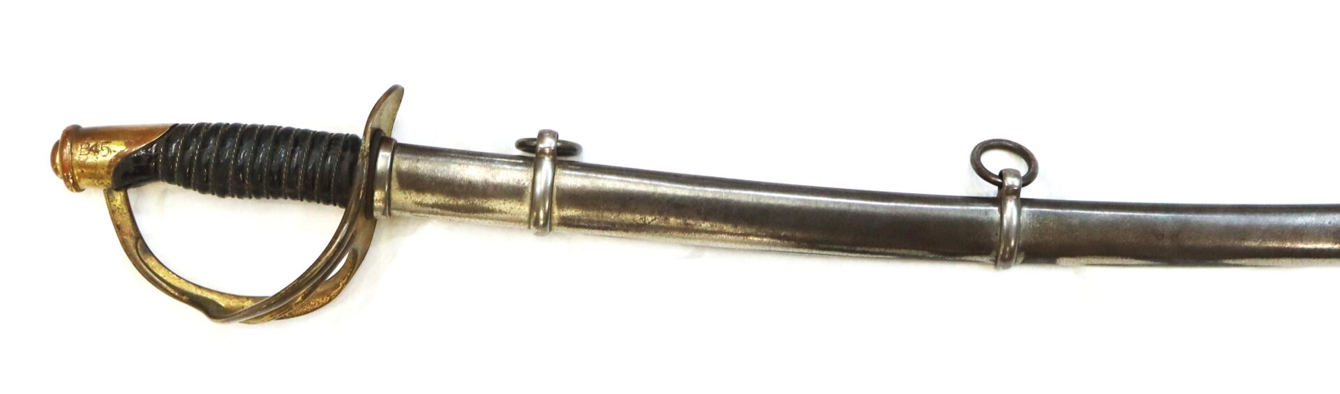 A metal sword with a curved blade, two metal rings, and a black and gold handle with a protective guard, photographed on a white background.
