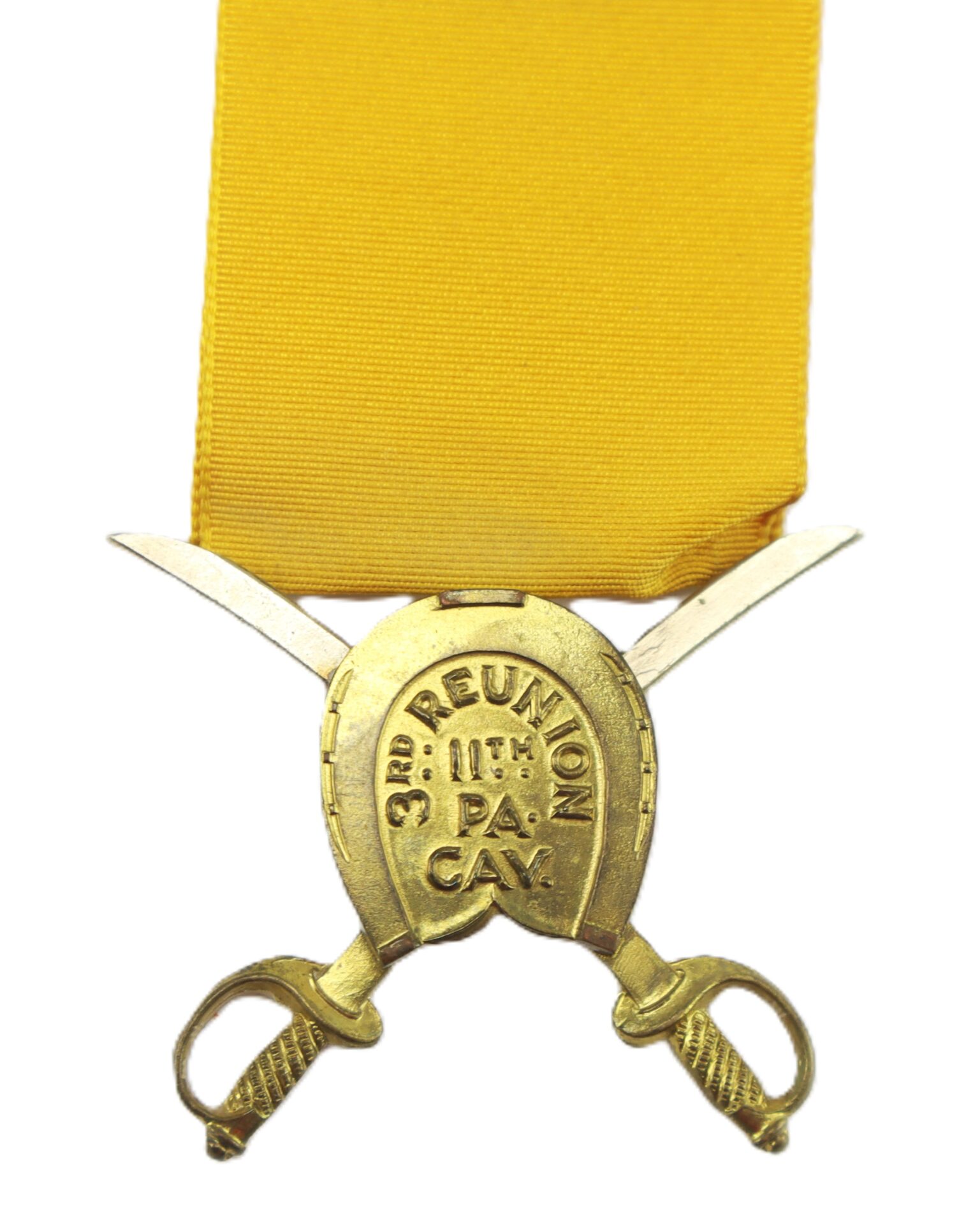 A gold medal with two crossed swords, a yellow ribbon, and the inscription "3rd Reunion 11th PA. CAV.