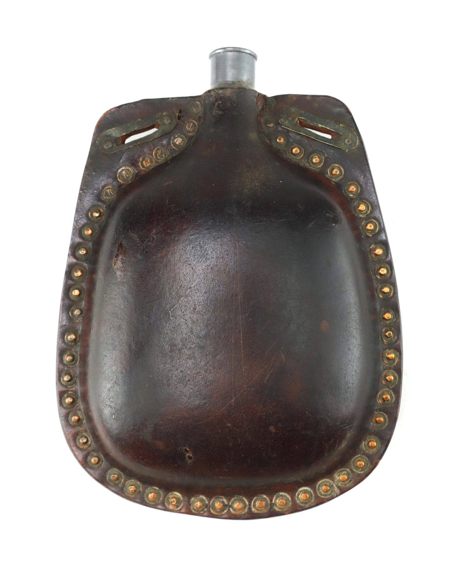 A vintage leather-covered metal canteen with brass studs around the edge and a silver-colored screw-top opening.
