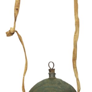 The Federal Model 1858 ‘Bullseye’ Canteen features a round, greenish body with a narrow neck, metal cap, and worn beige fabric strap attached on both sides.