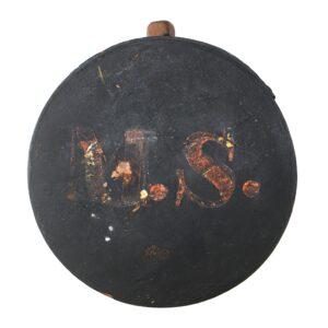A round, black wooden Mexican War Cheesebox Canteen with faded red and yellow "M.S." letters painted on its surface.