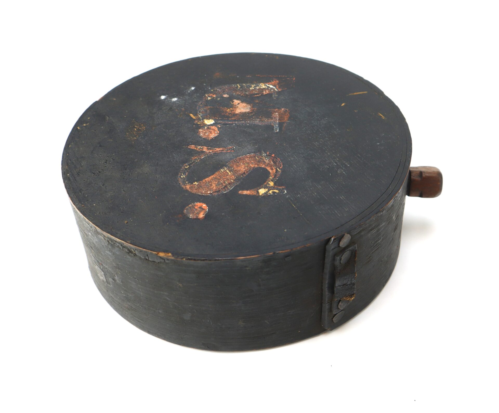 A round, black metal Mexican War Cheesebox Canteen with a faded "U.S." marking on the lid and a small side handle.