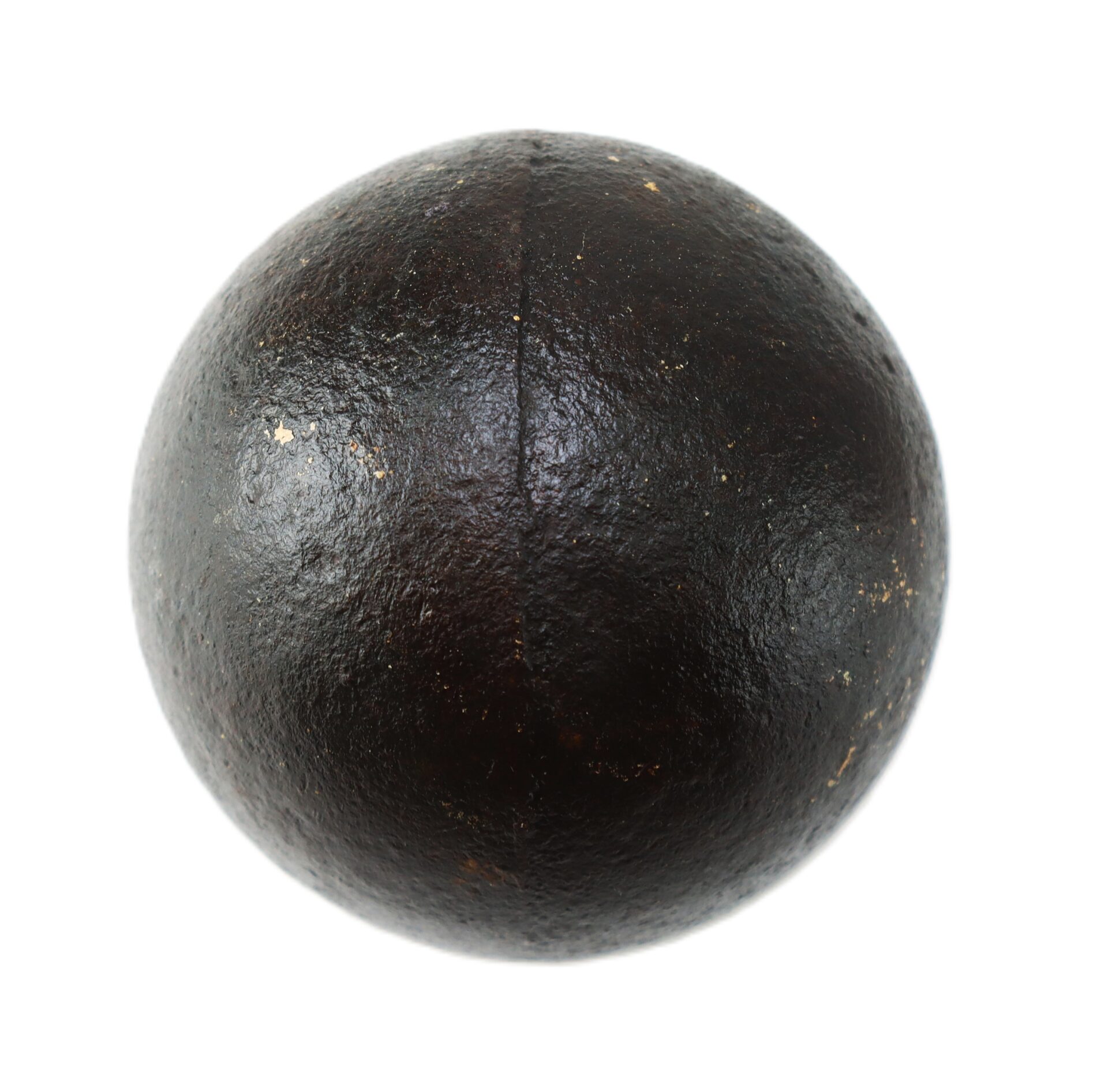 A round, dark brown iron cannonball with a slightly rough surface and visible seam running down the middle, shown against a white background.
