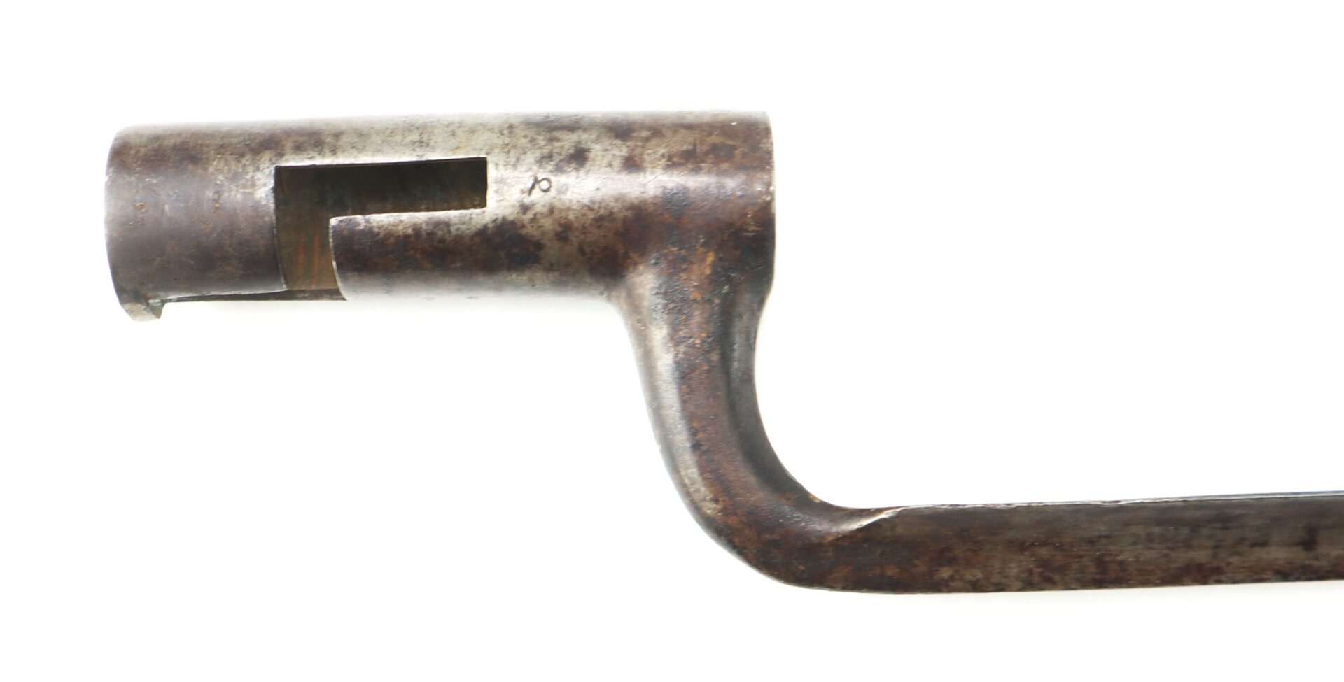 Close-up of a rusted, L-shaped metal object with a cylindrical end featuring a rectangular cutout, set against a white background.