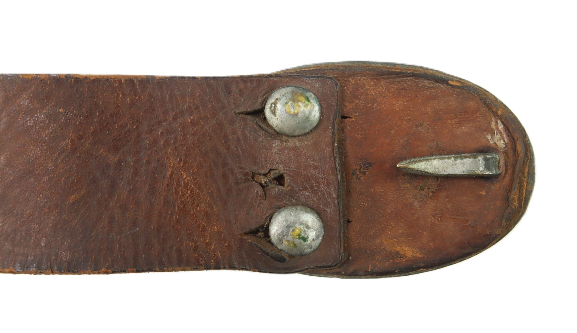 Close-up of a worn brown leather strap with two metal rivets and a metal hook on one end, set against a white background.