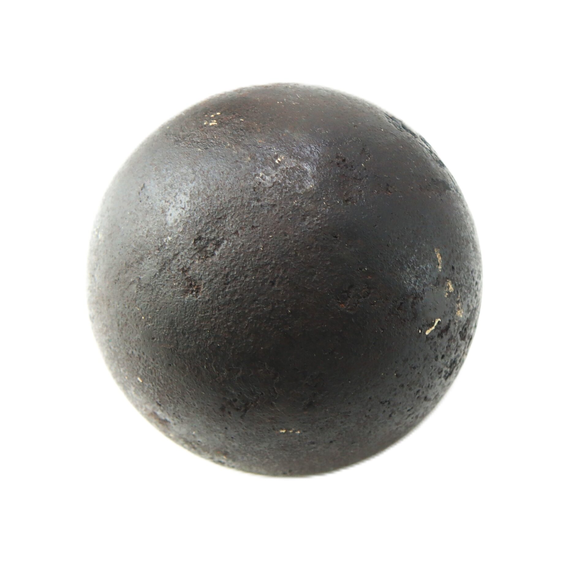 A Confederate Civil War 6-Pounder solid shot cannonball from Bull Run, round and dark with a rough, slightly rusty surface, shown against a white background.