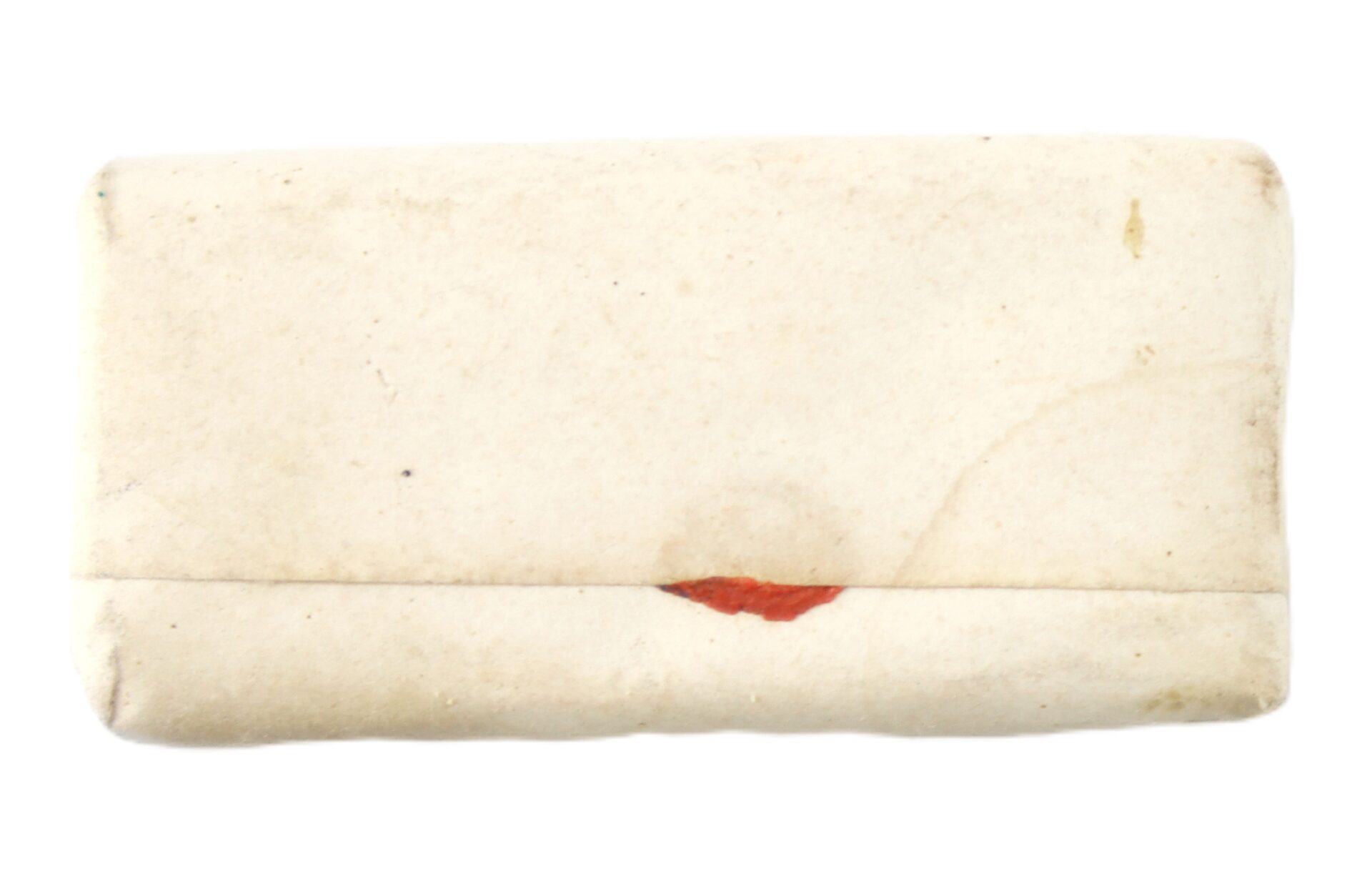 A small, rectangular white envelope labeled "Dr. Strong’s Vegetable Stomach Pills" and sealed with a red wax mark is shown against a plain background.