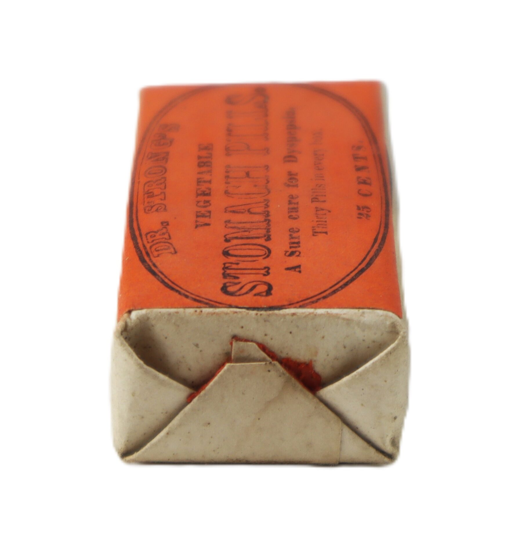 Rectangular vintage orange and white paper package of Dr. Strong’s Vegetable Stomach Pills, featuring folded ends and visible printed labeling.