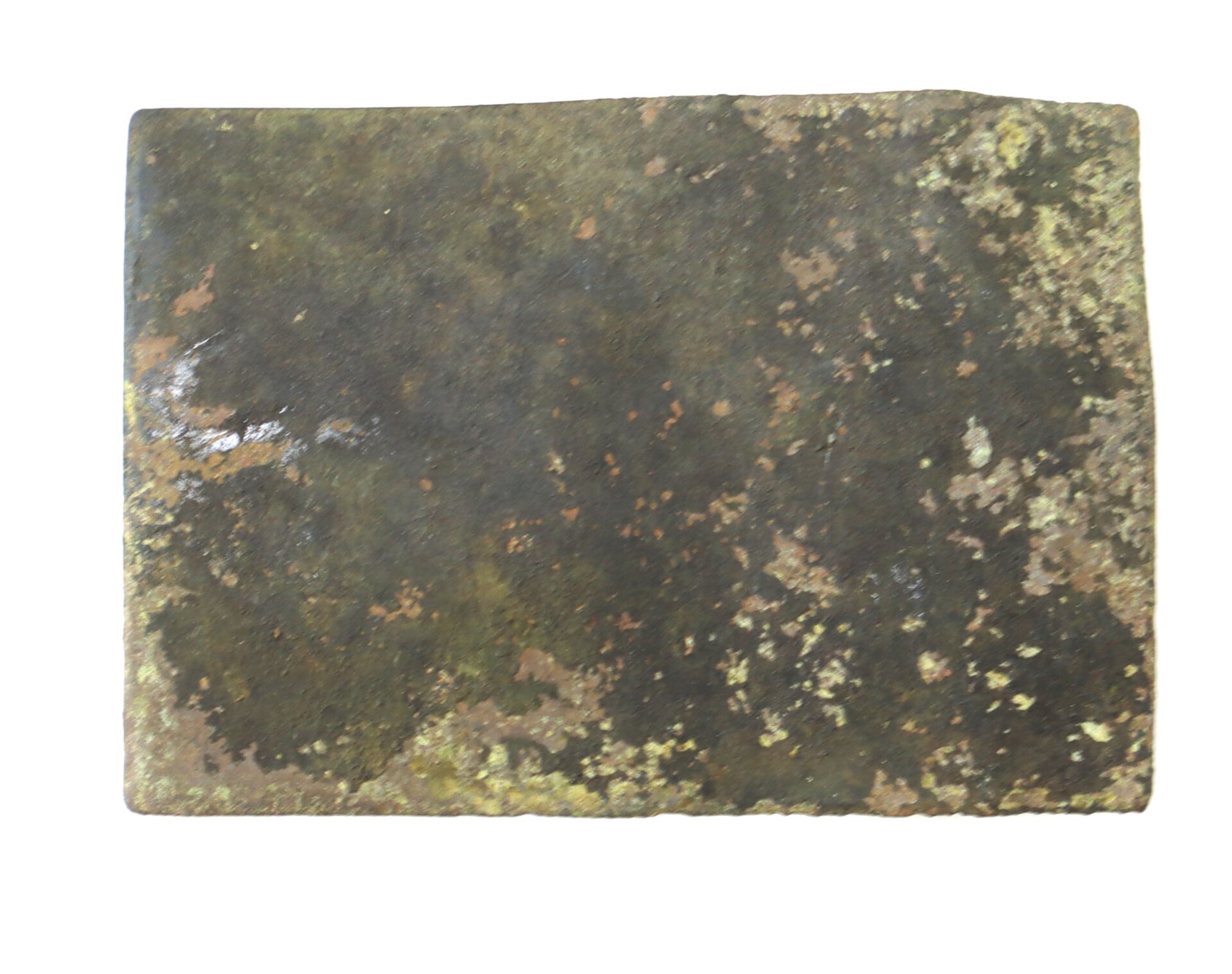 A rectangular, flat stone slab with a rough, weathered surface and patches of moss or lichen.