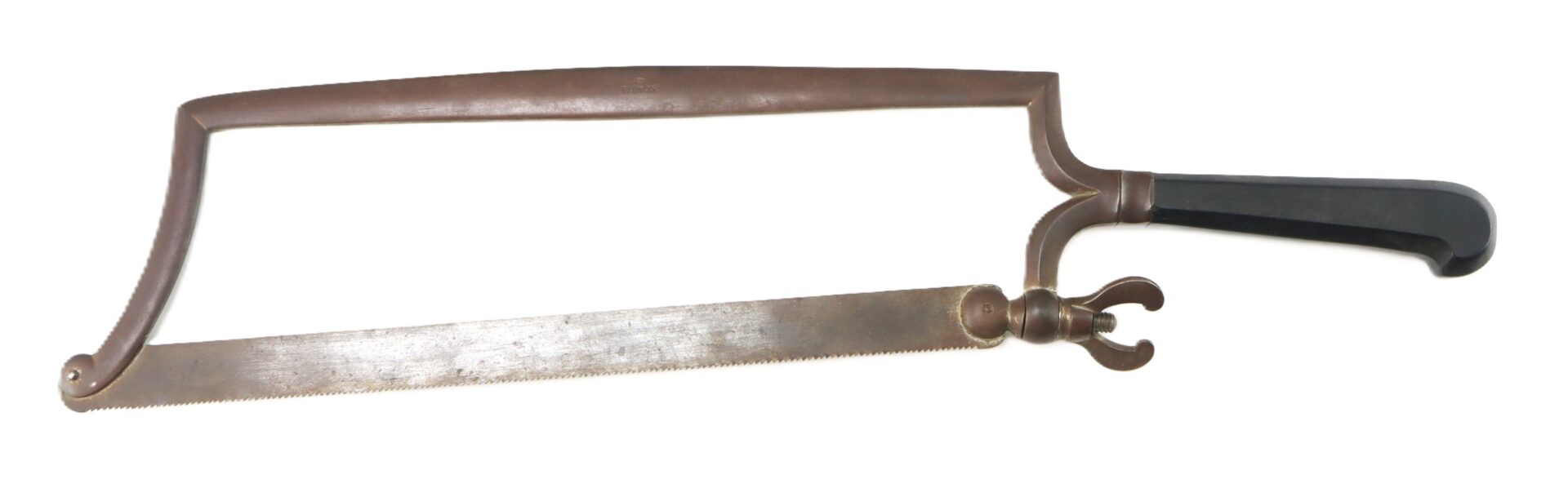 A vintage bone saw with a metal frame, straight serrated blade, and a black handle, photographed on a white background.