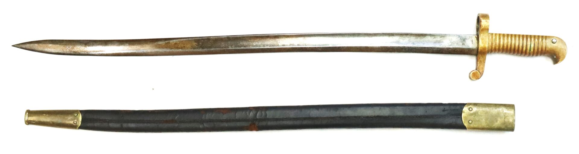 A vintage sword with a brass hilt and curved handle is shown above a black leather scabbard with brass fittings, both displayed on a white background.