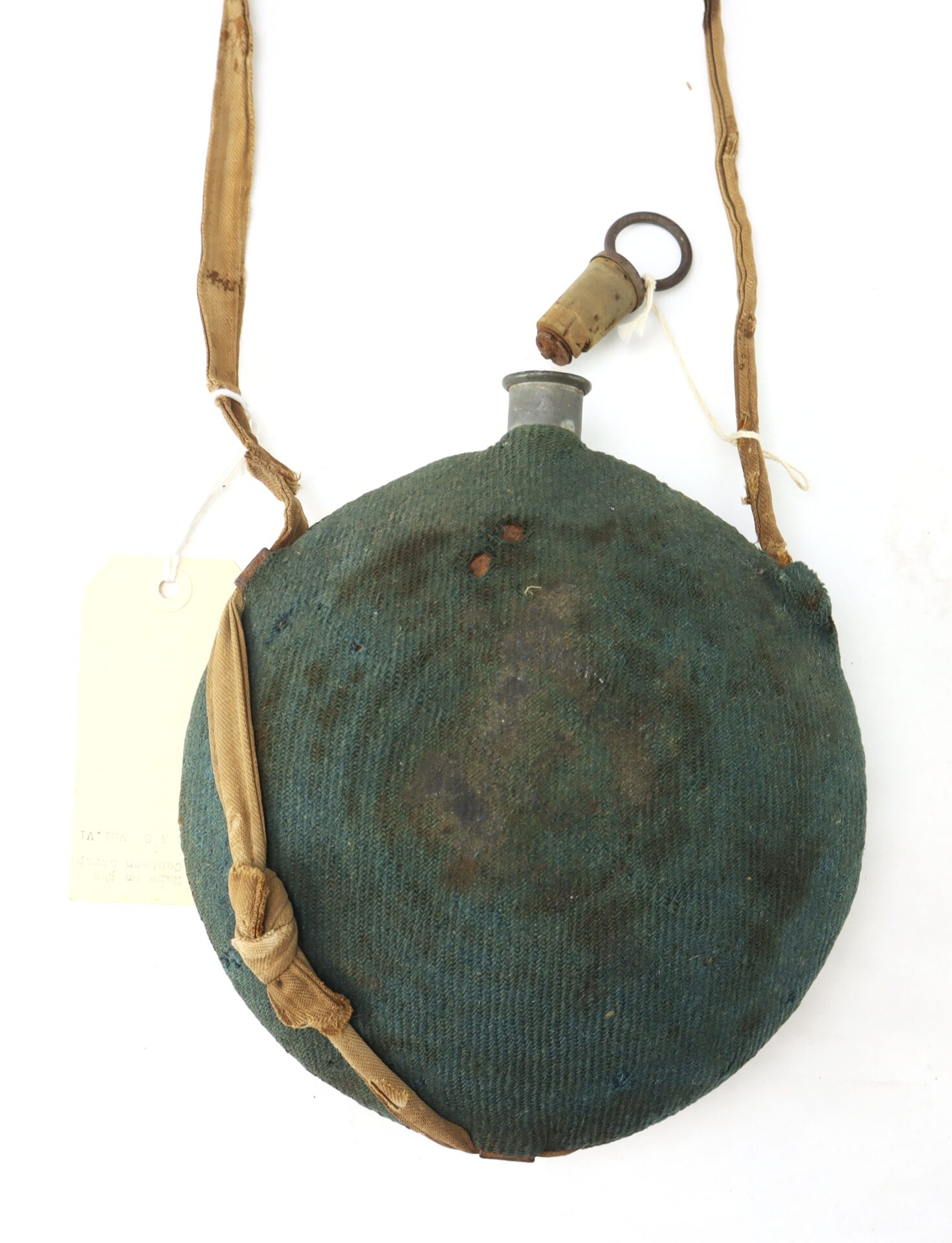 An Outstanding Identified Massachusetts Heavy Artillery Canteen belonging to Benjamin D. Reed, 30th Unattached Co., Mass. Heavy Artillery, is shown—round with worn green fabric, tan strap, and metal cap against a white background.