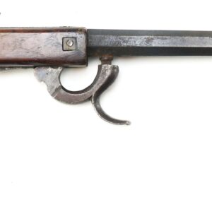 Side view of an old, single-shot pistol with a wooden grip and a long, hexagonal metal barrel on a white background.